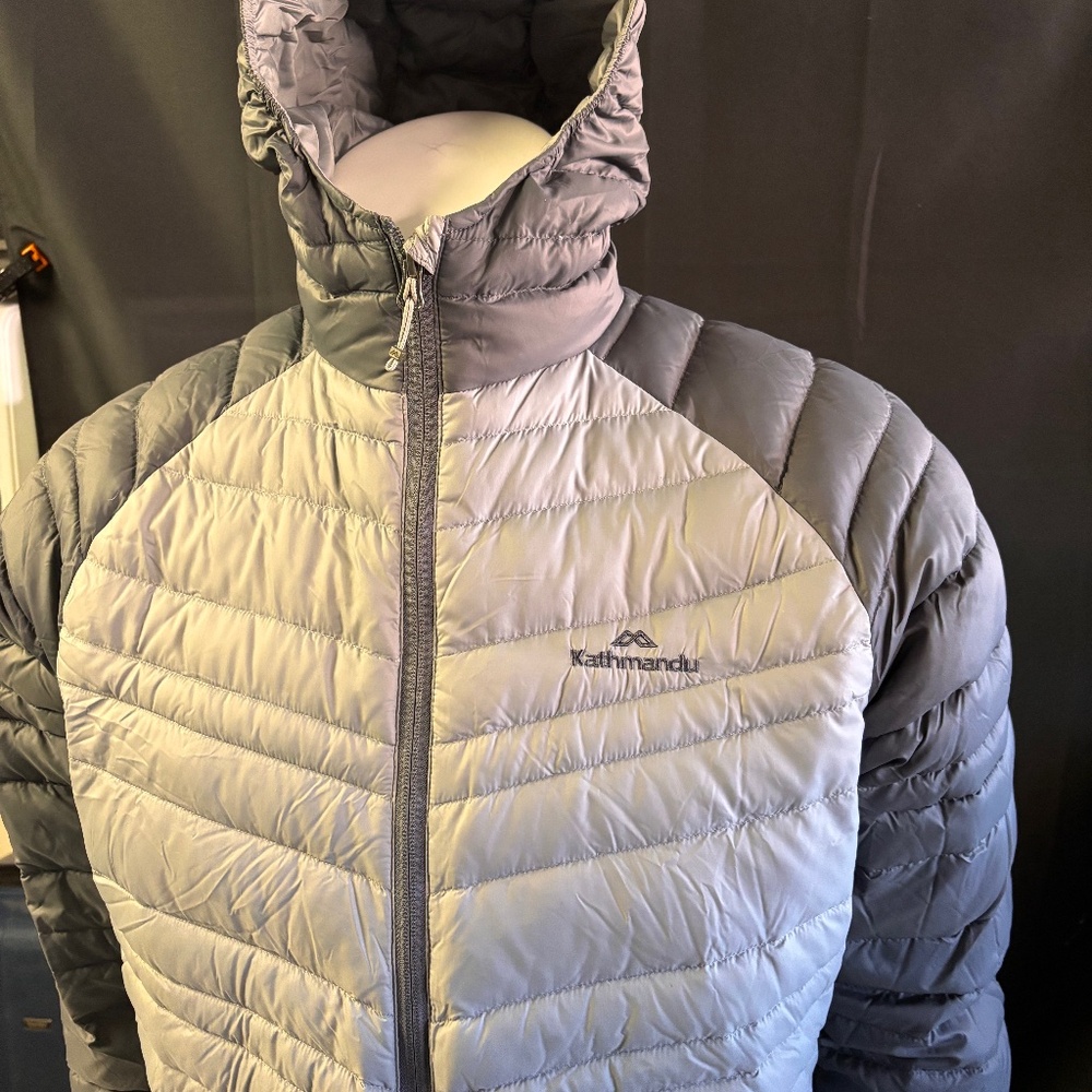 Awesome womens large Kathmandu duck down jacket
